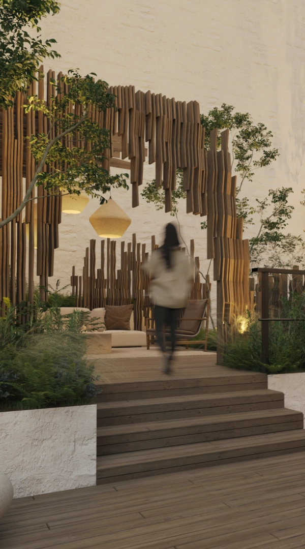 Eine Dachterrasse in einem Wiener Innenhof mit einer Pergola aus Holz
