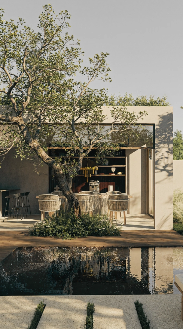 Ein schattiger Burgenländischer Innenhof mit einer Loungegruppe und einem Outdoor-Kamin